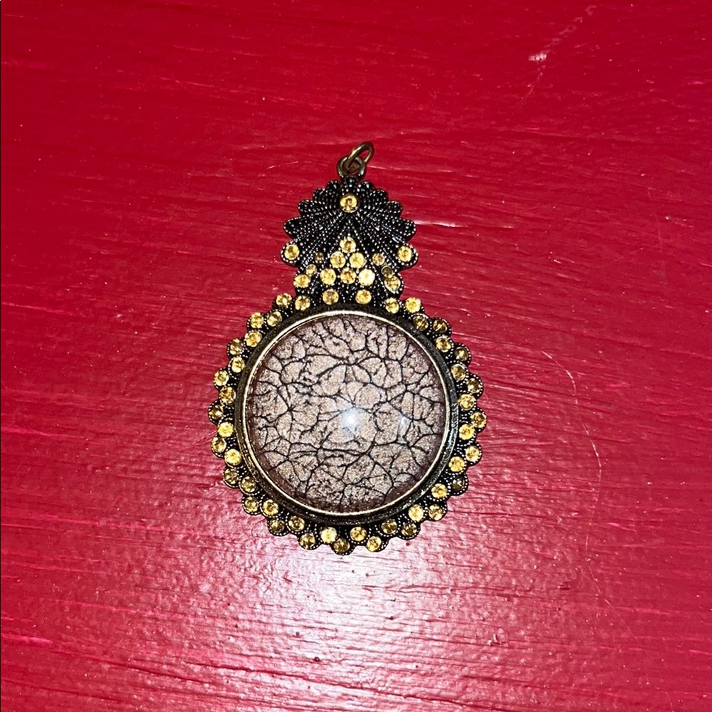 Elegant Gold and Black Pendant